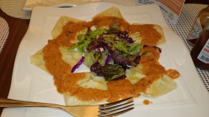 Our Ravioli stuffed with cream cheese and basil, sauteed in butter, topped with tomato sauce.  Delicious!